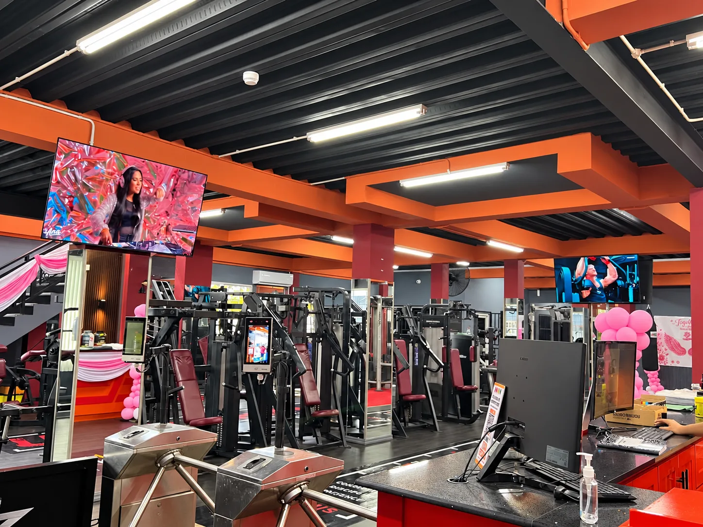 Another view of the gym floor and weight training machines